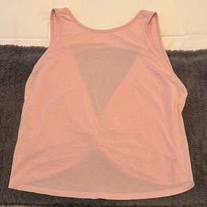 Light pink Lululemon tank with open back and twist